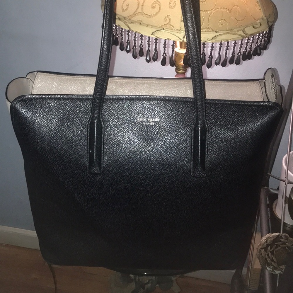 Leather Kate Spade in Black and blush
Comes with matching wallet